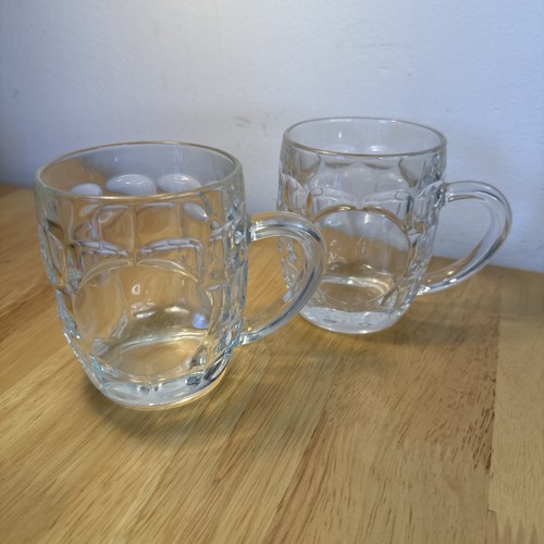 Two dimpled half pint - half, beer