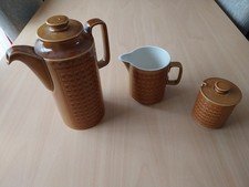 Hornsea Saffron Ceramic Coffee Pot, Milk Jug And Sugar Bowl. Dated 1973/74.