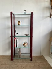 Large deep red postmodern shelving unit with toughened glass shelves