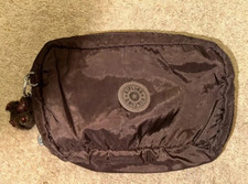 Brown Kipling toiletry bag