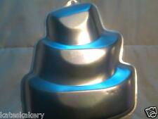  WiltonTiered TOPSY TURVY Cake