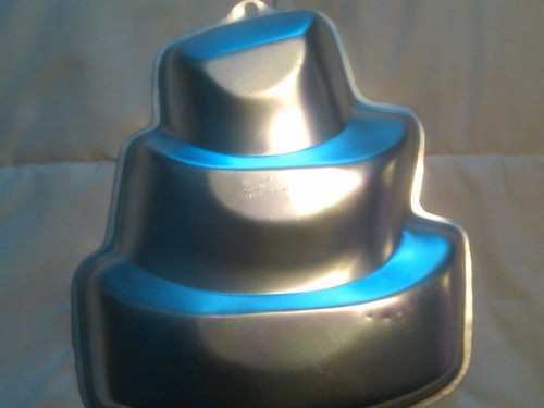Wiltontiered topsy turvy cake - ,
