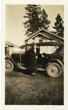 Woman Posing by Old Classic