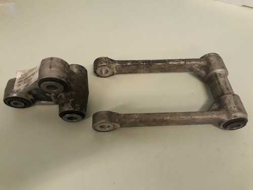 Rear suspension shock linkage