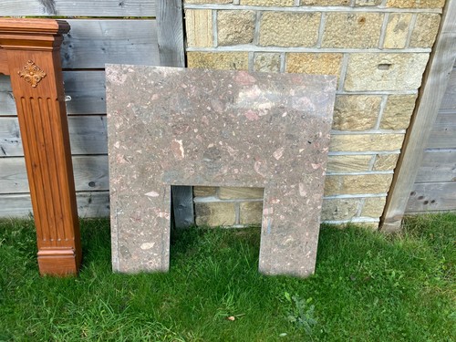 Brown pine fire surround with