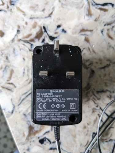 Sharp mains charger for