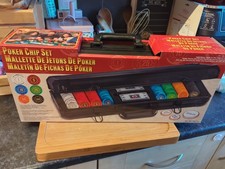 Poker chip set with 400 numbered chips, dealer and blind buttons.