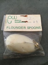 2 VINTAGE PERCY WADHAMS FLOUNDER SPOONS IN THERE PACKET.