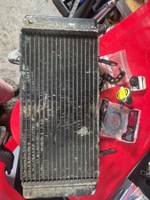 Suzuki Sv1000s Radiator And Parts Including Clutch Rod Seal And Sprocket