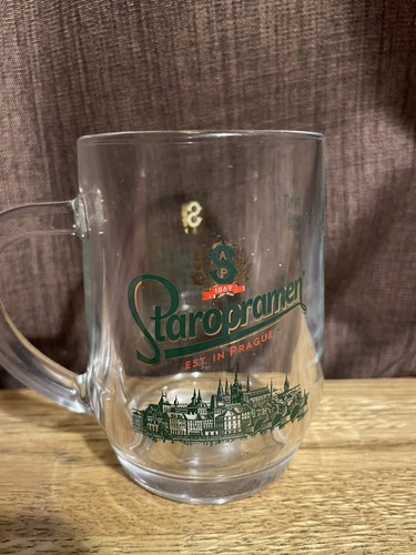 Staropramen half pint beer - half,
