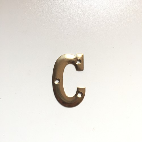 Polished brass raised - raised, house
