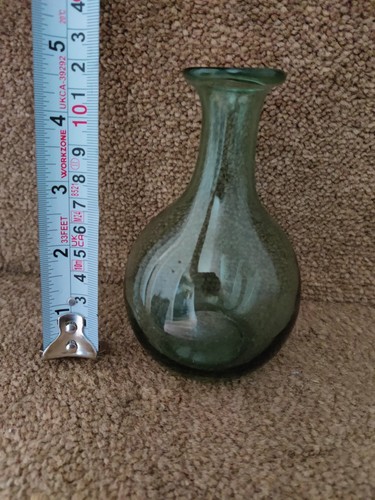 Vintage green glass bottle