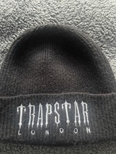This is a brand-new, never worn Trapstar beanie in black Authentic.