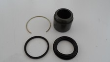 Front brake caliper piston and - caliper,