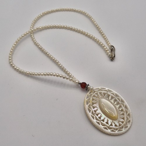 Carved mother pearl - carved, of