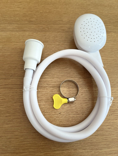 White handheld shower head - shower,