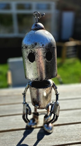Large metal robot with a - a,