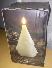 NEXT SANTA SHAPED LED WAX