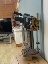 Vintage Black & Decker corded electric drill (Model D142) with drill press stand