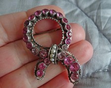 FRENCH GEORGIAN PASTE BROOCH Foil backed pink stones in silver with pearl collar