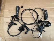 Carrera tektro oil brake set with 9 speed Atlus gears , grips