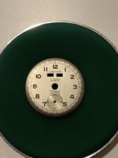 Vintage Louvic triple date watch dial