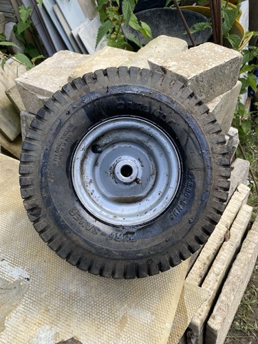 Ride mower front wheel and - mower,