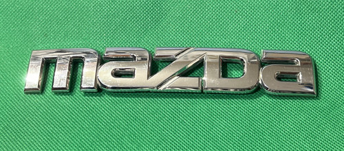 Mazda car emblem badge - car,