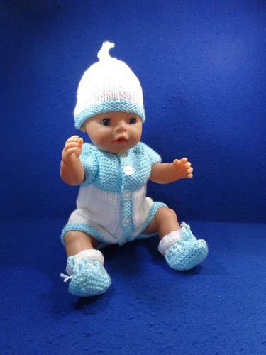 Hand knitted clothes for - hand,
