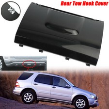 Rear bumper tow hook cover - tow,