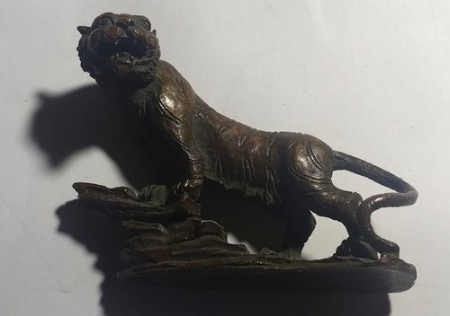 Bronze figure prowling - figure, a