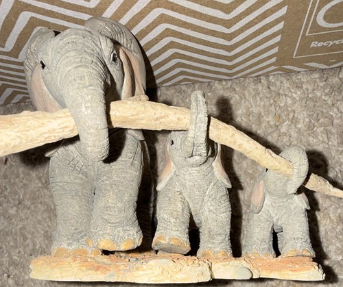 Enesco tuskers helping - enesco, trunks