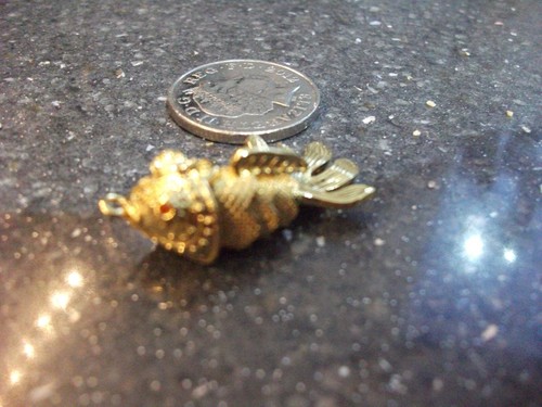 Articulated fish pendant gold - fish,