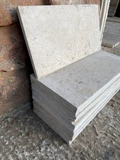 Solid limestone tiles. Suitable for wall or floor installation.