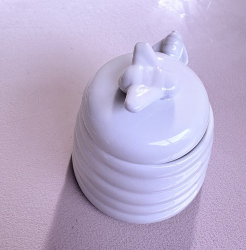 Small ceramic honey pot with