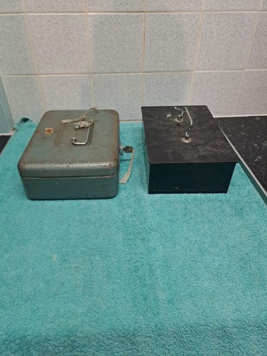 Two vintage metal cash - two,