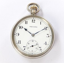1920'S METAL CASED RECORD 15 JEWELS SWISS LEVER POCKET WATCH IN WORKING ORDER