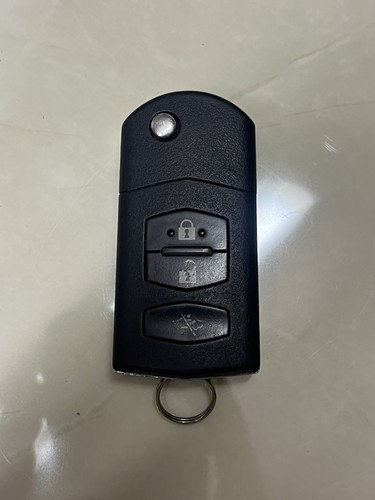 Genuine mazda button remote - mazda,