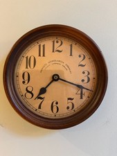 small wall clock, made by Newgate Memorabilia Company 