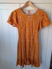 Size 6 Millie MacIntosh Mustard Dress. Worn once and from a smoke free home.