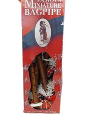 Bagpipes Of Caledonia (Miniature Bagpipe with Tartan Cover and Reed)
