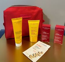 CLARINS RED COSMETIC BAG with 2 mini products and 3 samples