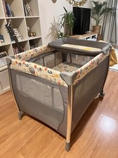 Mothercare giraffe travel cot - mothercare,