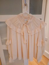 Beige/apricot/peach  pussybow