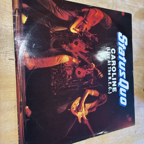 Status quo caroline live - status,