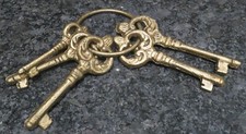 Bunch of 5 Large Metal Jailers Keys on Ring Theatrical Prop