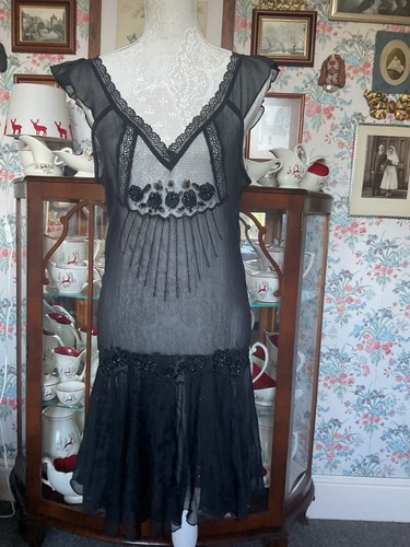 Size miss selfridge - 12, sheer