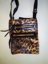 womans leapord skin bag