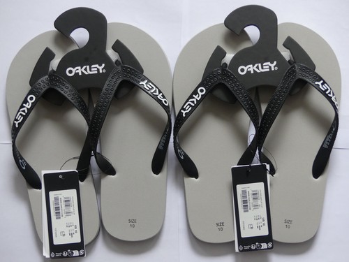 Two pairs oakley golden oak - oakley,