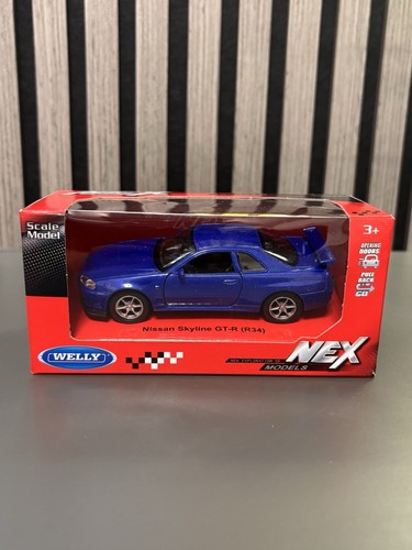 Welly scale blue nissan - 1:24,